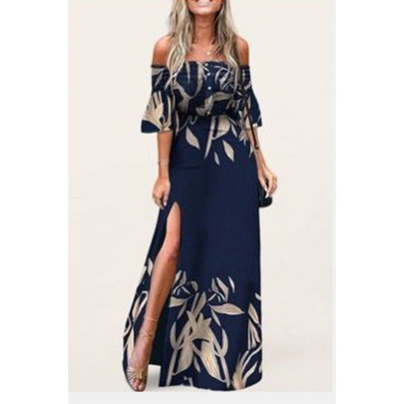 Damska maxikjol med off-shoulder design och eleganta blommönsterdetaljer Mirla-Eva Jonsson