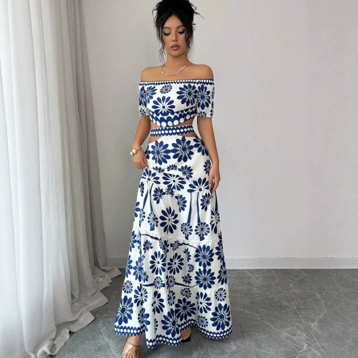 Damska maxiklänning med blommönster och trendig off-shoulder-cutout Mirla-Eva Jonsson
