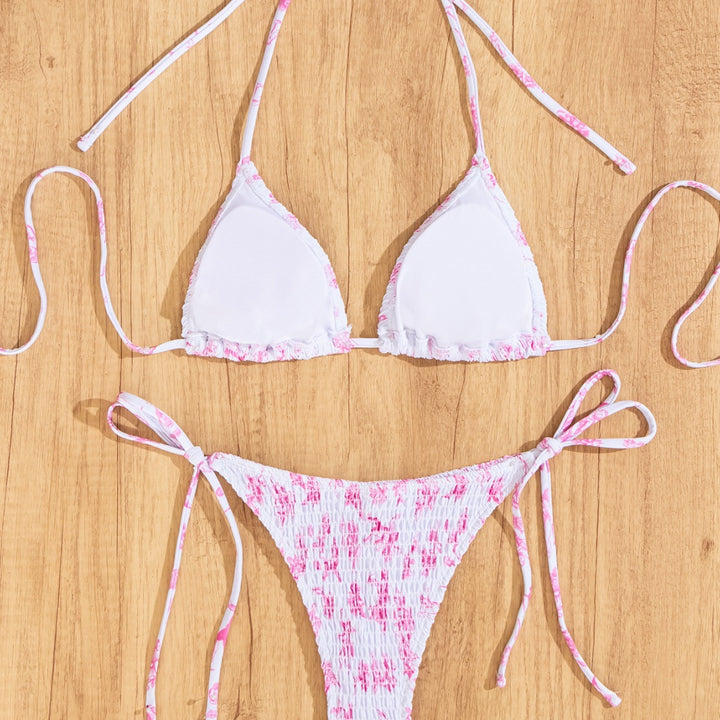 Damski triangel-bikini med lekfullt leo-design och justerbara band Mirla-Eva Jonsson