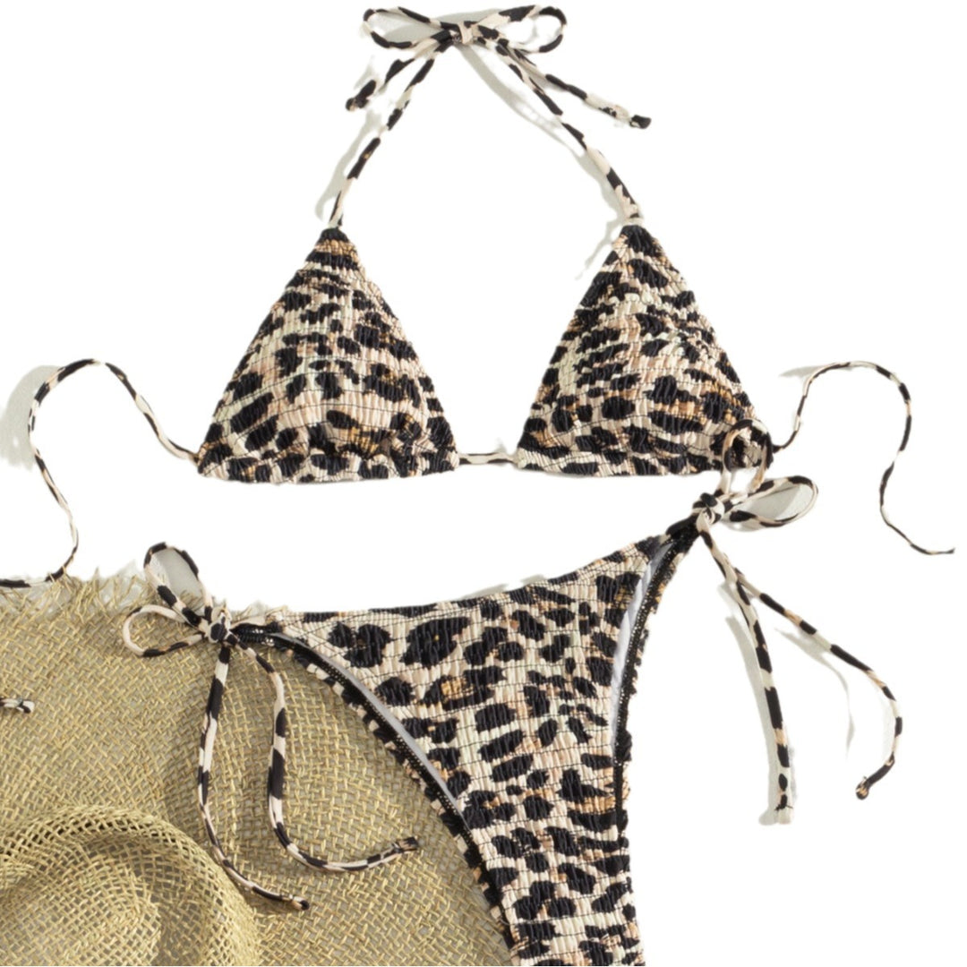 Damski triangel-bikini med lekfullt leo-design och justerbara band Mirla-Eva Jonsson