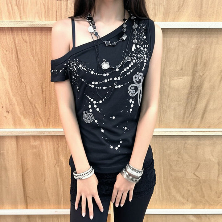 Damskin överdel med off-shoulder design och glittrande detaljer Mirla-Eva Jonsson