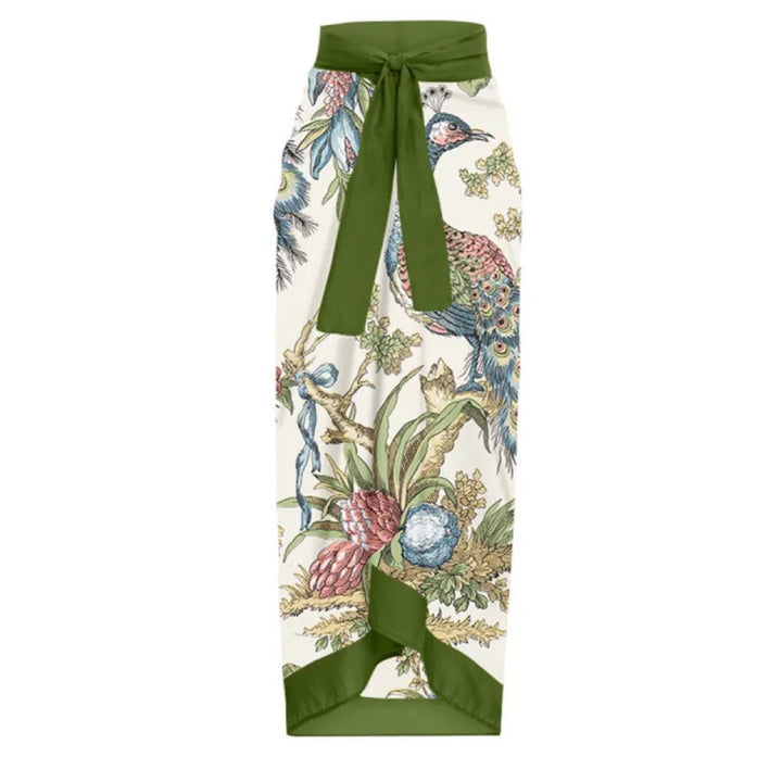 Damskjol med blommotiv och elegant rosettapplikation Mirla-Eva Jonsson
