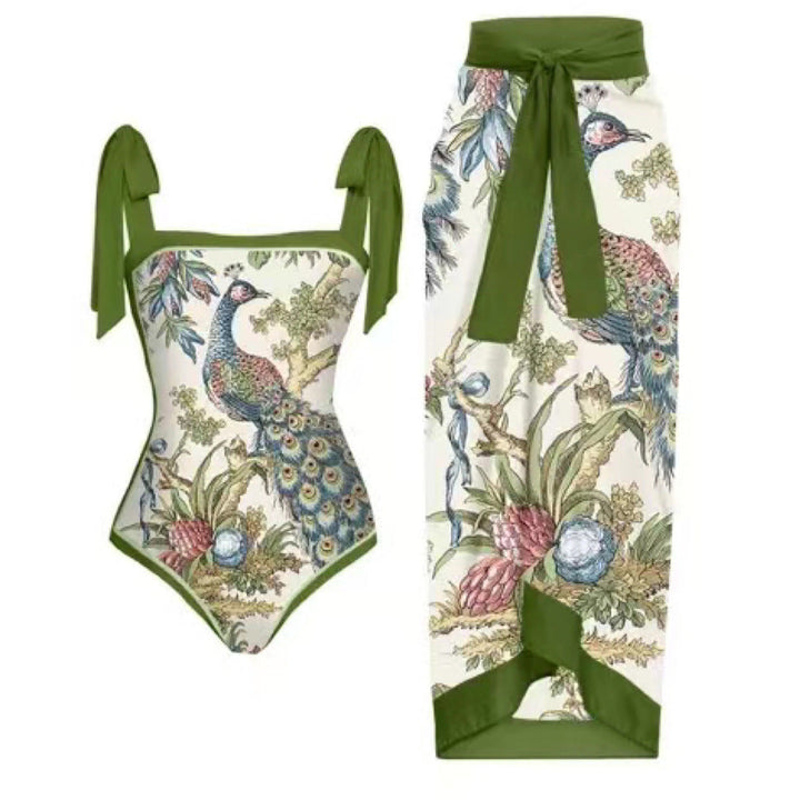 Damskjol med blommotiv och elegant rosettapplikation Mirla-Eva Jonsson