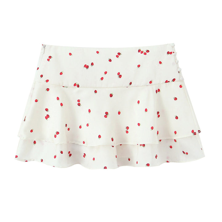 Damskjol med lekfullt jordgubbsgrafikdesign och voluminös snitt Mirla-Eva Jonsson
