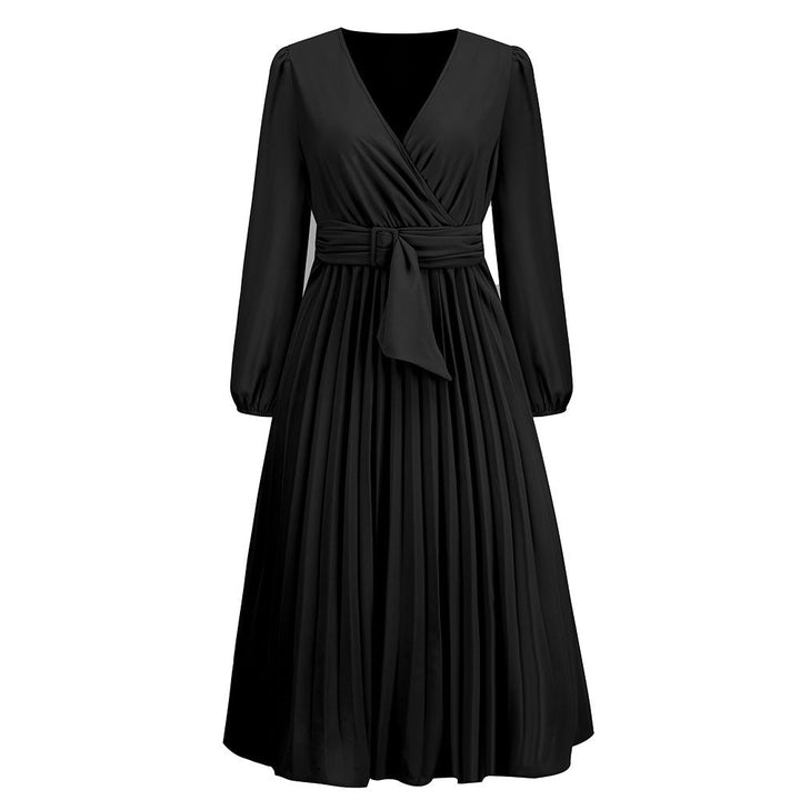 Damskjol med plisserad design och elegant midjebälte Mirla-Eva Jonsson