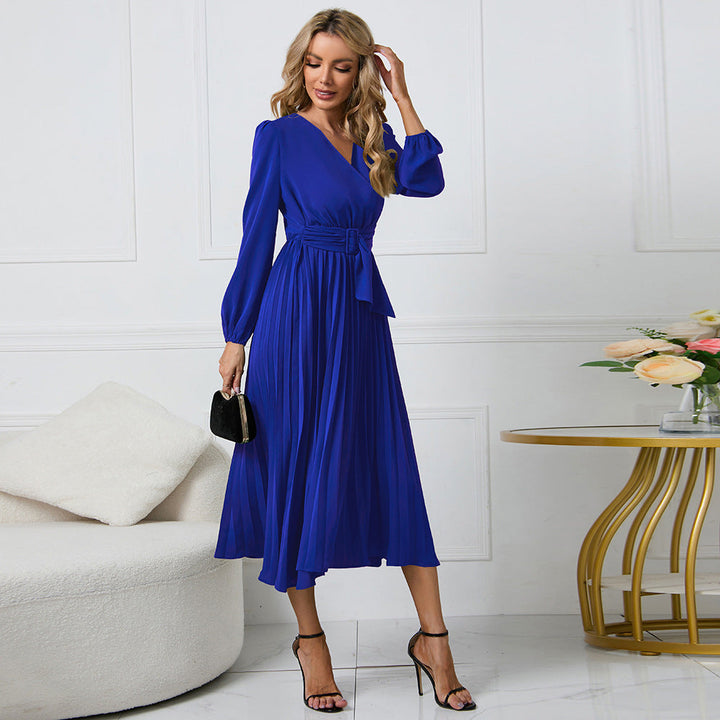 Damskjol med plisserad design och elegant midjebälte Mirla-Eva Jonsson