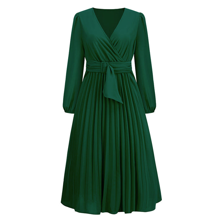 Damskjol med plisserad design och elegant midjebälte Mirla-Eva Jonsson