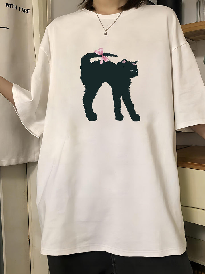 Damskjort med kreativ kattmotiv och lekfull rosett Mirla-Eva Jonsson