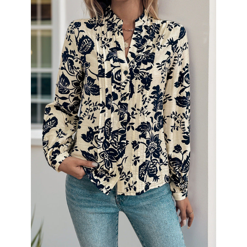 Damskjorta med blommotiver och elegant rynkning Mirla-Eva Jonsson