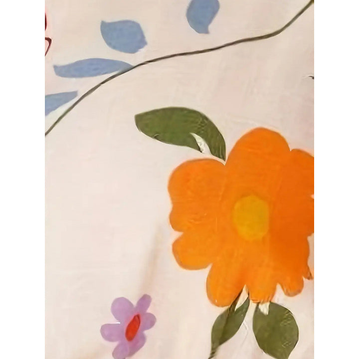 Damskjortset med blommönster och elastisk midja Mirla-Eva Jonsson
