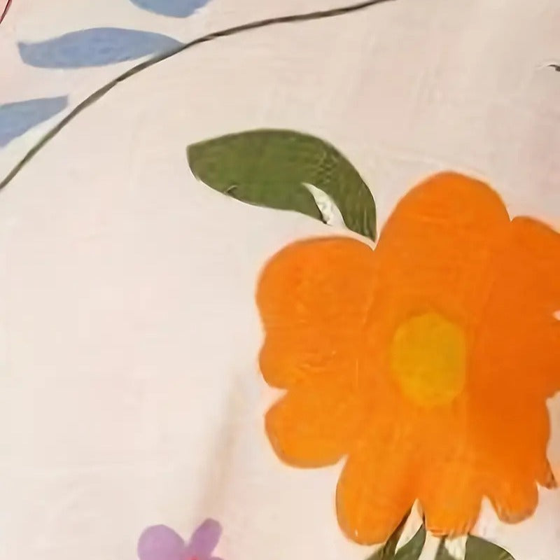 Damskjortset med blommönster och elastisk midja Mirla-Eva Jonsson