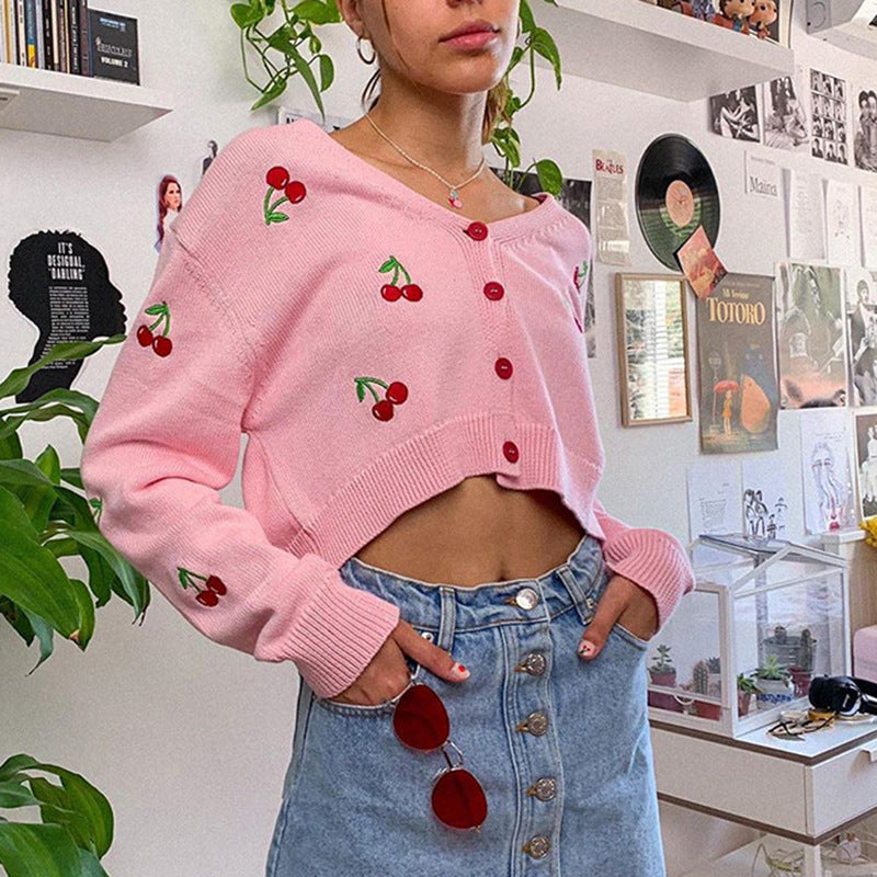 Damsknitjacka med lekfullt körsbärsmotiv och knapbart design Eva Jonsson-Eva Jonsson