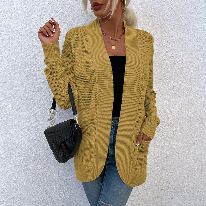 Damsko kofta med avslappnad passform och öppna fickor Mirla-Eva Jonsson