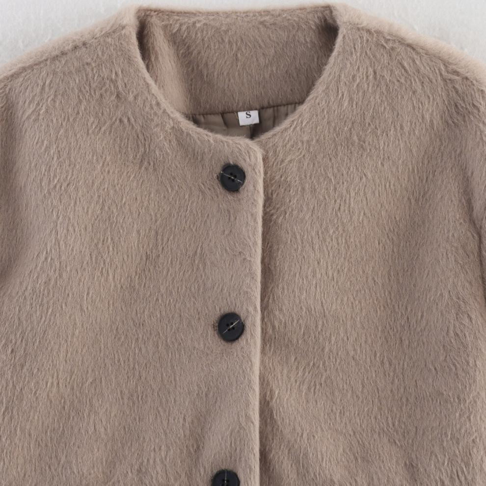 Damskort jacka med fleece-yta och dekorativa knappar Mirla-Eva Jonsson