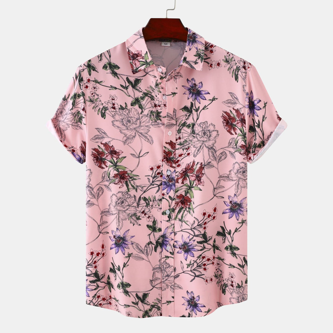 Damskortärmad skjorta med blommiga accenter och modern skärning Mirla-Eva Jonsson