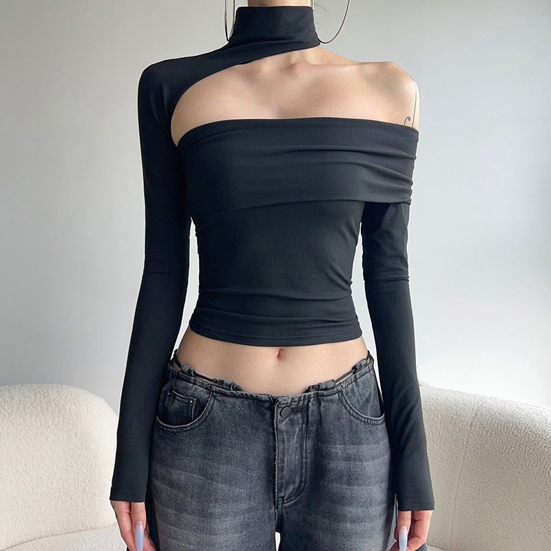 Damskt modernt plagg med asymmetrisk skärning och elegant volangdetalj Mirla-Eva Jonsson