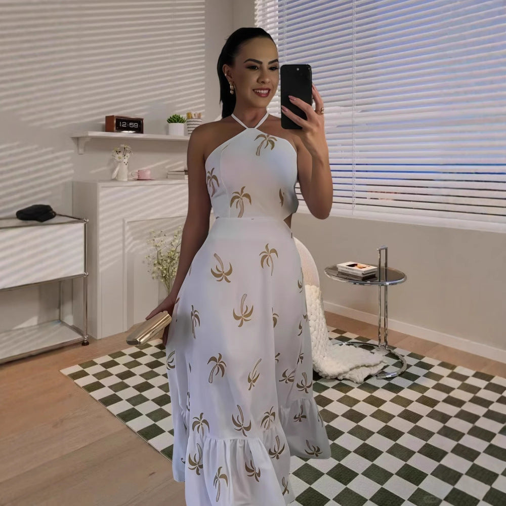 Damsommar maxikläd med tropisk tryck och flödande fåll Mirla-Eva Jonsson
