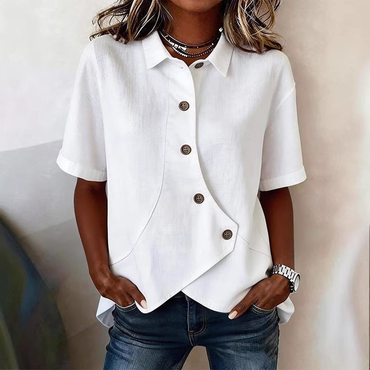 Damspecialdesignad blus med unik knapdetail Mirla-Eva Jonsson