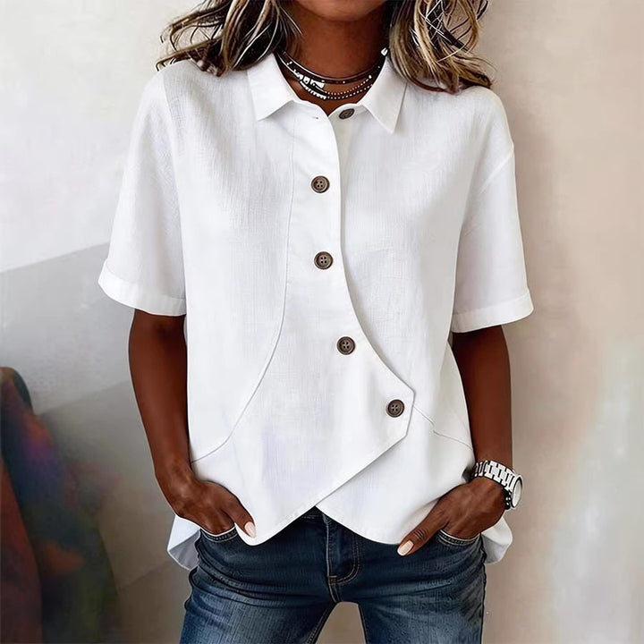 Damspecialdesignad blus med unik knapdetail Mirla-Eva Jonsson