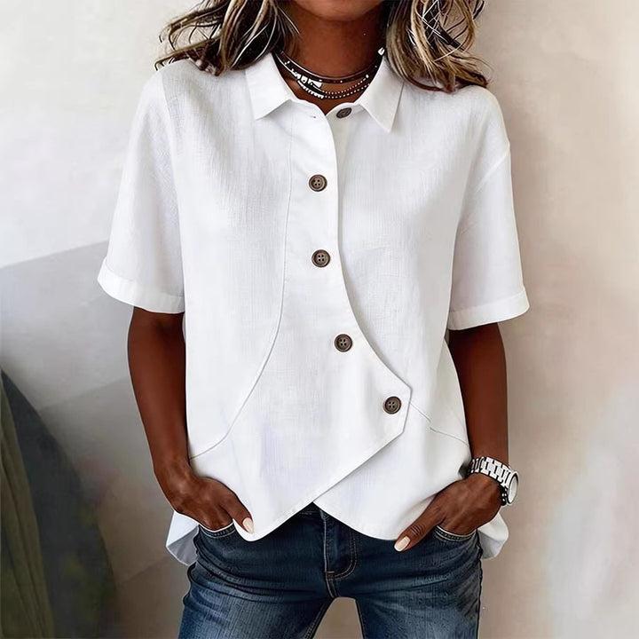 Damspecialdesignad blus med unik knapdetail Mirla-Eva Jonsson