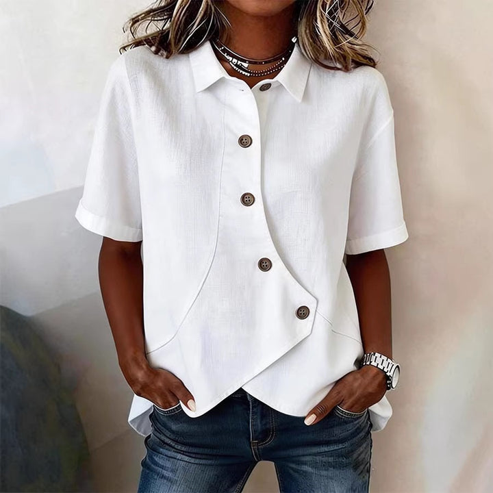 Damspecialdesignad blus med unik knapdetail Mirla-Eva Jonsson