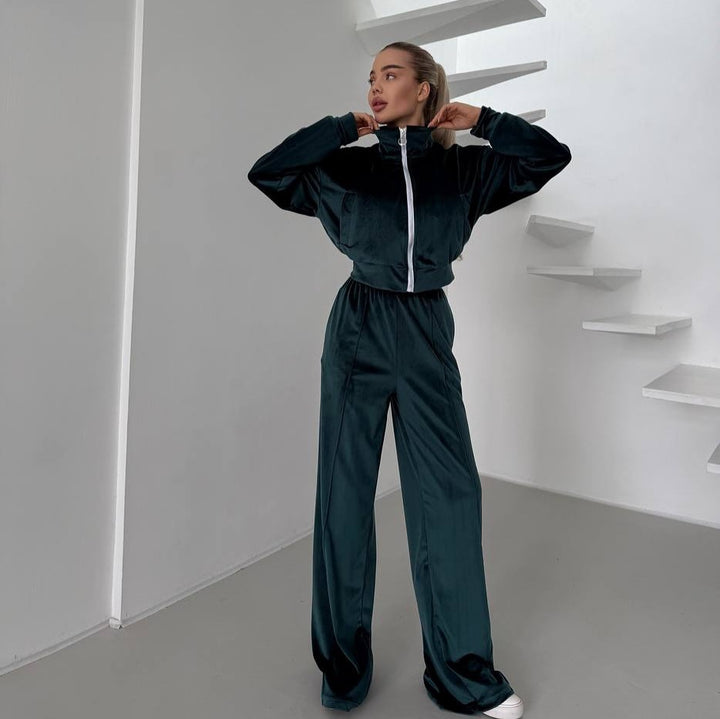 Damsportig fleece-joggingdräkt med fickad dragkedja och mjukt foder Mirla-Eva Jonsson