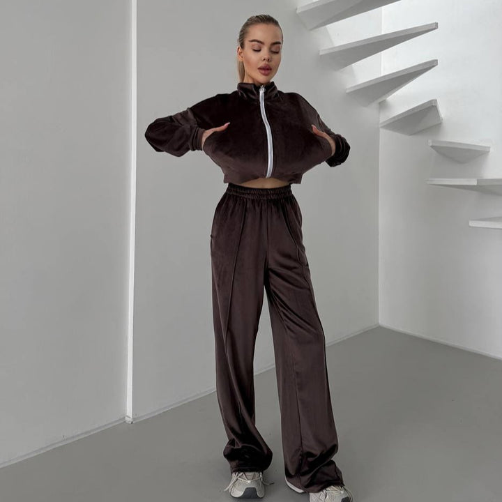 Damsportig fleece-joggingdräkt med fickad dragkedja och mjukt foder Mirla-Eva Jonsson