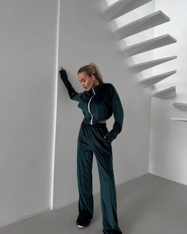Damsportig fleece-joggingdräkt med fickad dragkedja och mjukt foder Mirla-Eva Jonsson
