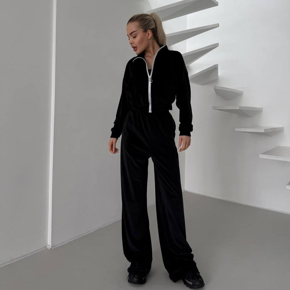 Damsportig fleece-joggingdräkt med fickad dragkedja och mjukt foder Mirla-Eva Jonsson