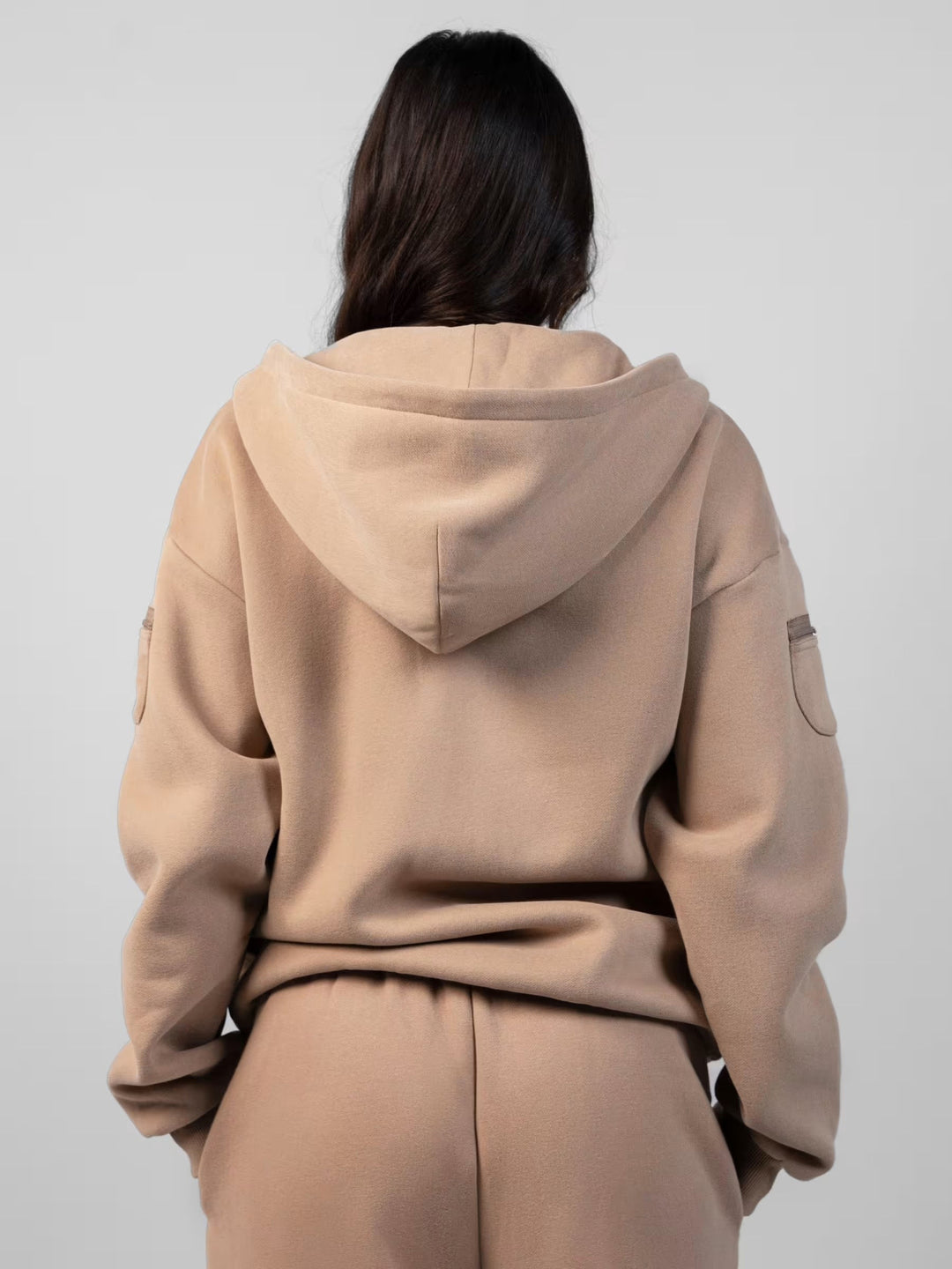 Damsportig fleece-joggingdräkt med hög krage och elastisk midja Mirla-Eva Jonsson