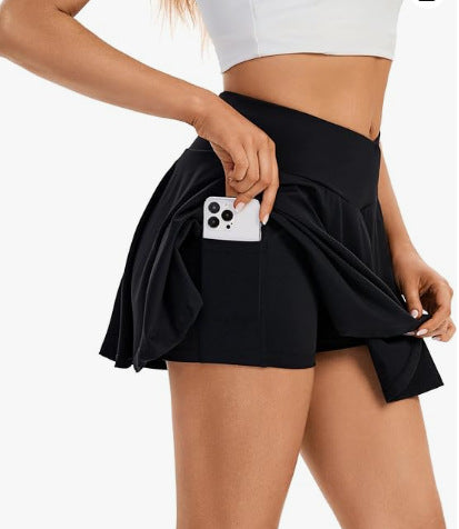 Damsportkjol med inbyggda shorts och praktiska fickor Mirla-Eva Jonsson