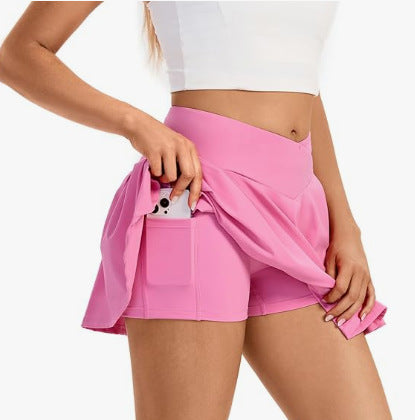 Damsportkjol med inbyggda shorts och praktiska fickor Mirla-Eva Jonsson