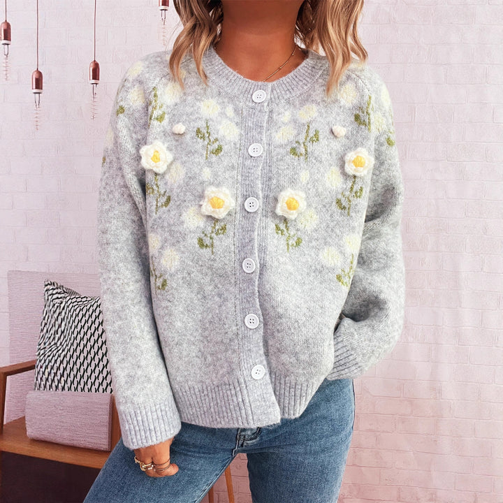 Damsticka med blommönster och knäppning Mirla-Eva Jonsson