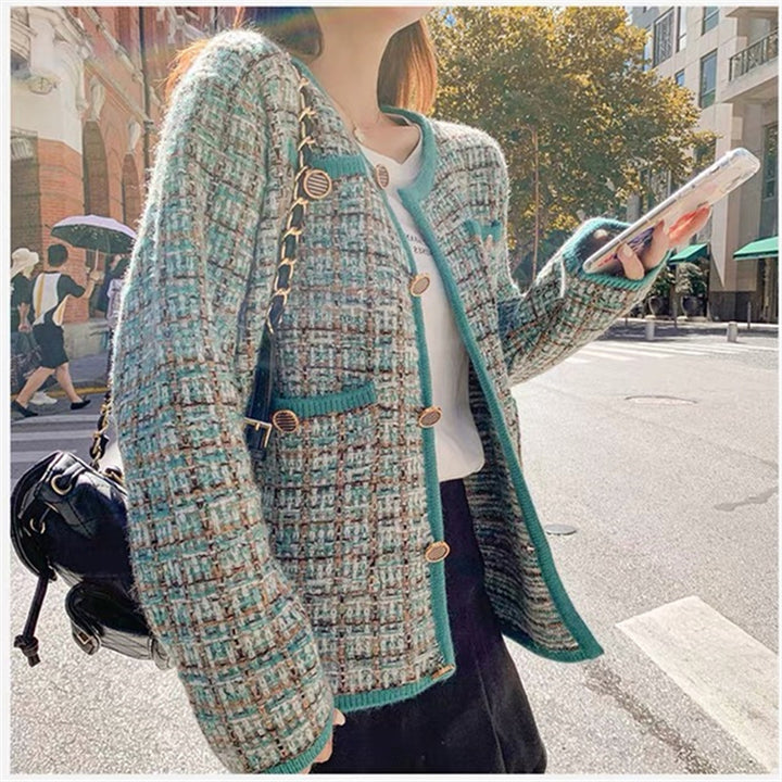 Damstickad Jacka med Elegant Design och Praktiska Fickor Mirla-Eva Jonsson