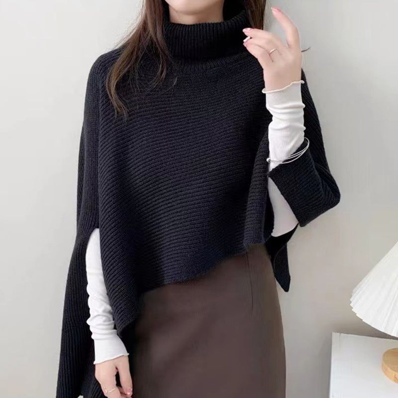 Damstickad Poncho med Högkrage och Elegant Ribbstruktur Mirla-Eva Jonsson