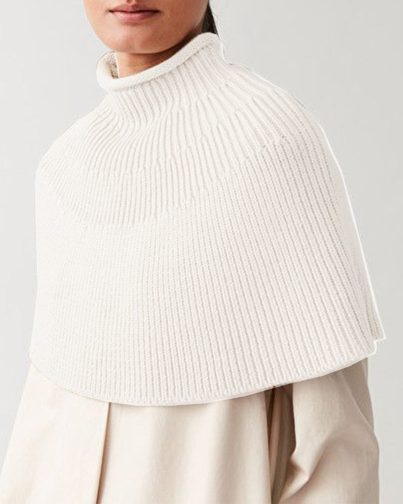 Damstickad cape med hög krage och fin ribbstruktur Eva Jonsson-Eva Jonsson