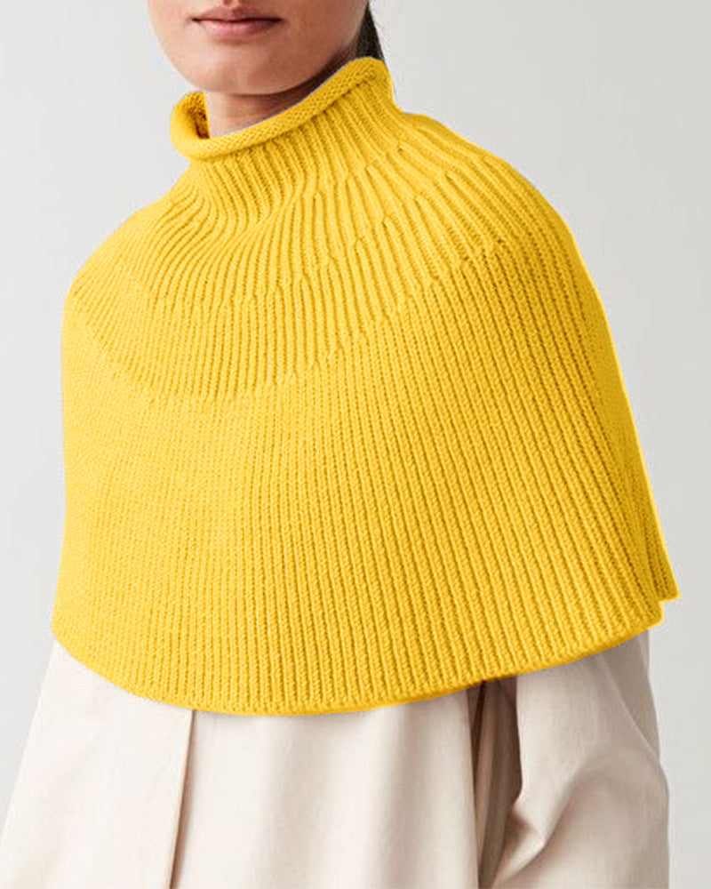 Damstickad cape med hög krage och fin ribbstruktur Eva Jonsson-Eva Jonsson