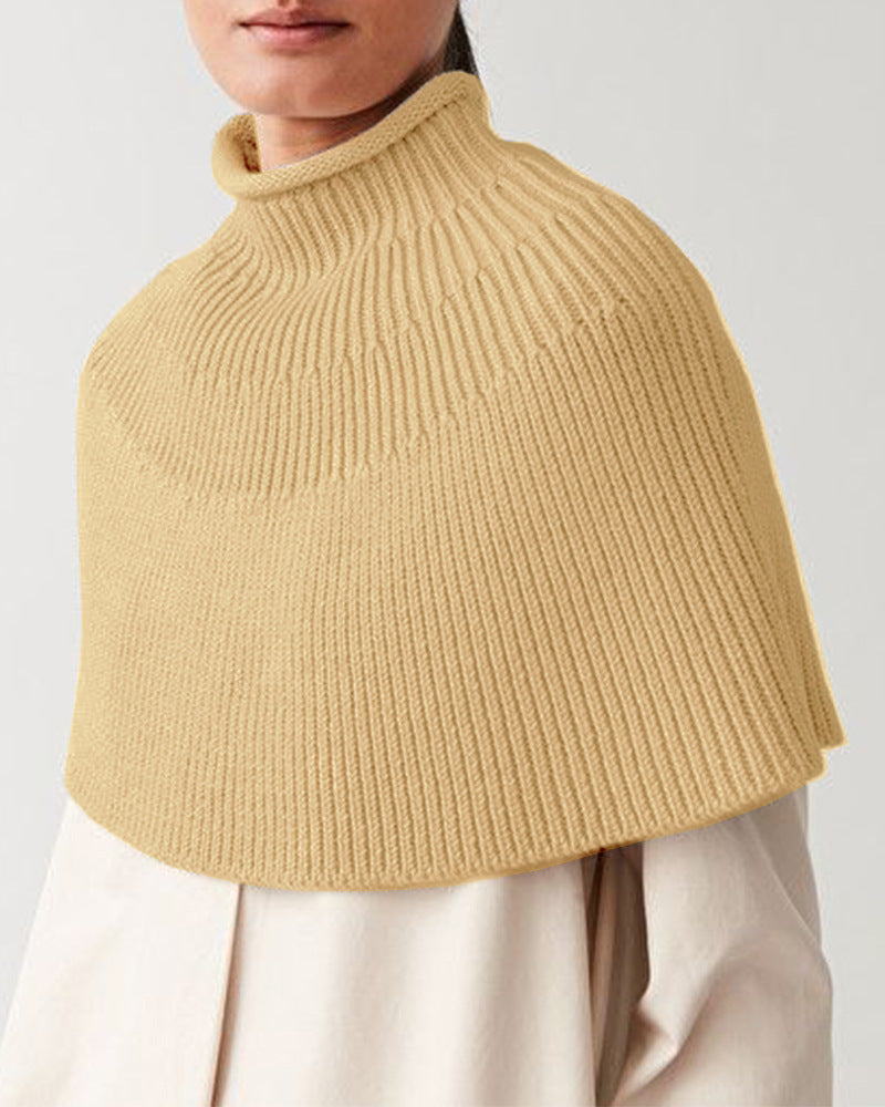 Damstickad cape med hög krage och fin ribbstruktur Eva Jonsson-Eva Jonsson