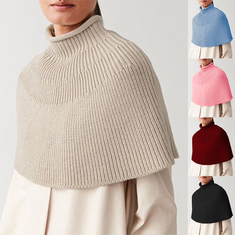 Damstickad cape med hög krage och fin ribbstruktur Eva Jonsson-Eva Jonsson