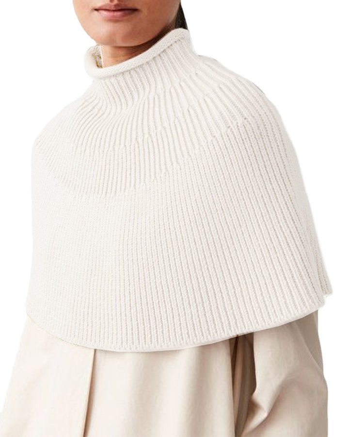 Damstickad cape med hög krage och fin ribbstruktur Eva Jonsson-Eva Jonsson
