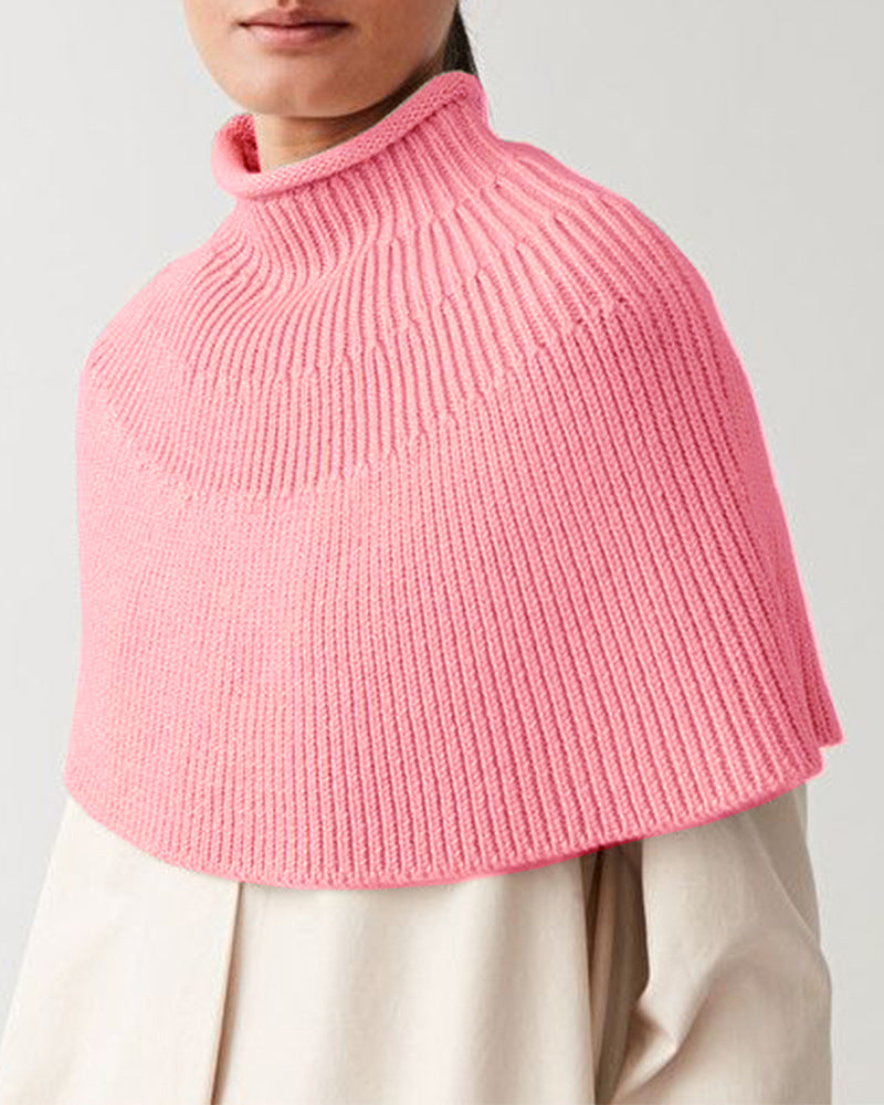 Damstickad cape med hög krage och fin ribbstruktur Eva Jonsson-Eva Jonsson