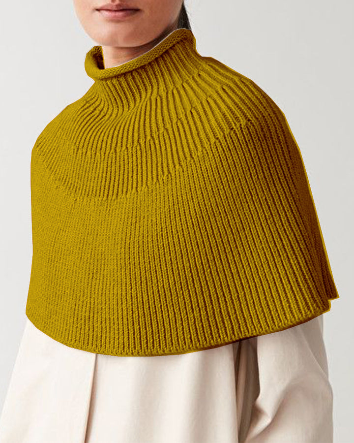 Damstickad cape med hög krage och fin ribbstruktur Eva Jonsson-Eva Jonsson
