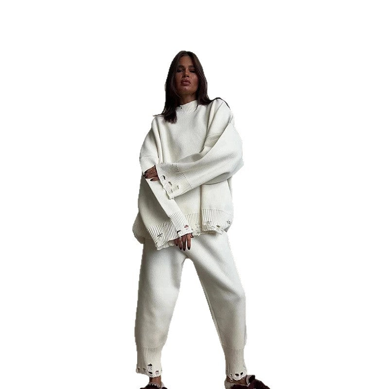 Damstickad dräkt med oversized snitt och modiga detaljer Mirla-Eva Jonsson