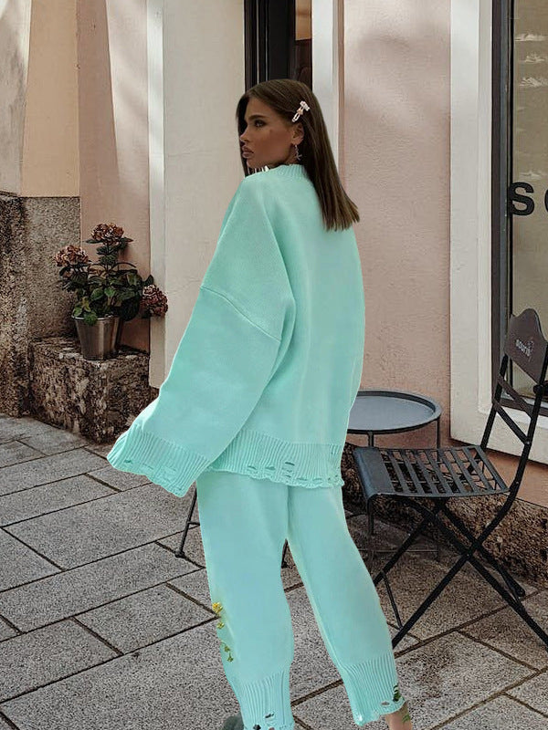 Damstickad dräkt med oversized snitt och modiga detaljer Mirla-Eva Jonsson