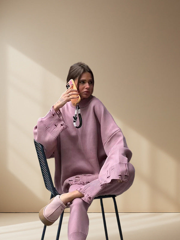 Damstickad dräkt med oversized snitt och modiga detaljer Mirla-Eva Jonsson