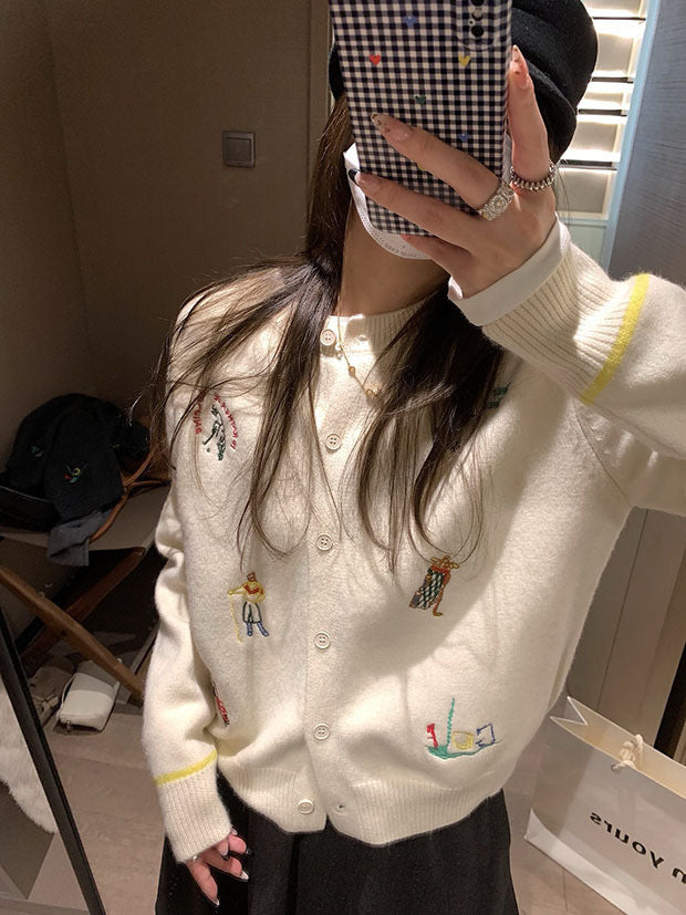 Damstickad jacka med färgglada broderidetaljer och klassiker i oversized design Mirla-Eva Jonsson