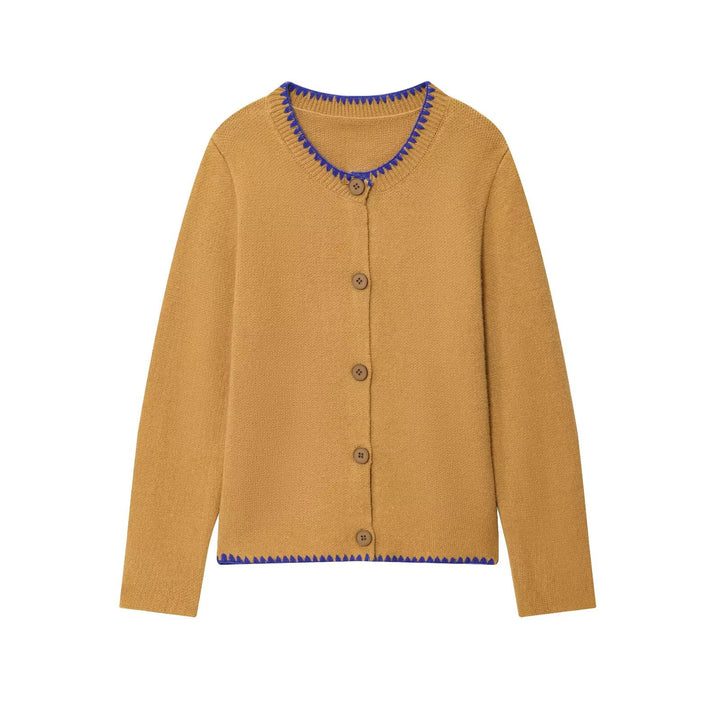 Damstickad jacka med kontrasterande detaljer och elegant knäppning Mirla-Eva Jonsson