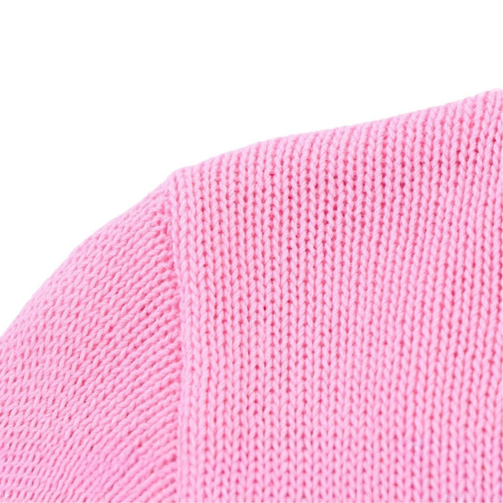 Damstickad jacka med volangdetaljer och knäppningar Mirla-Eva Jonsson