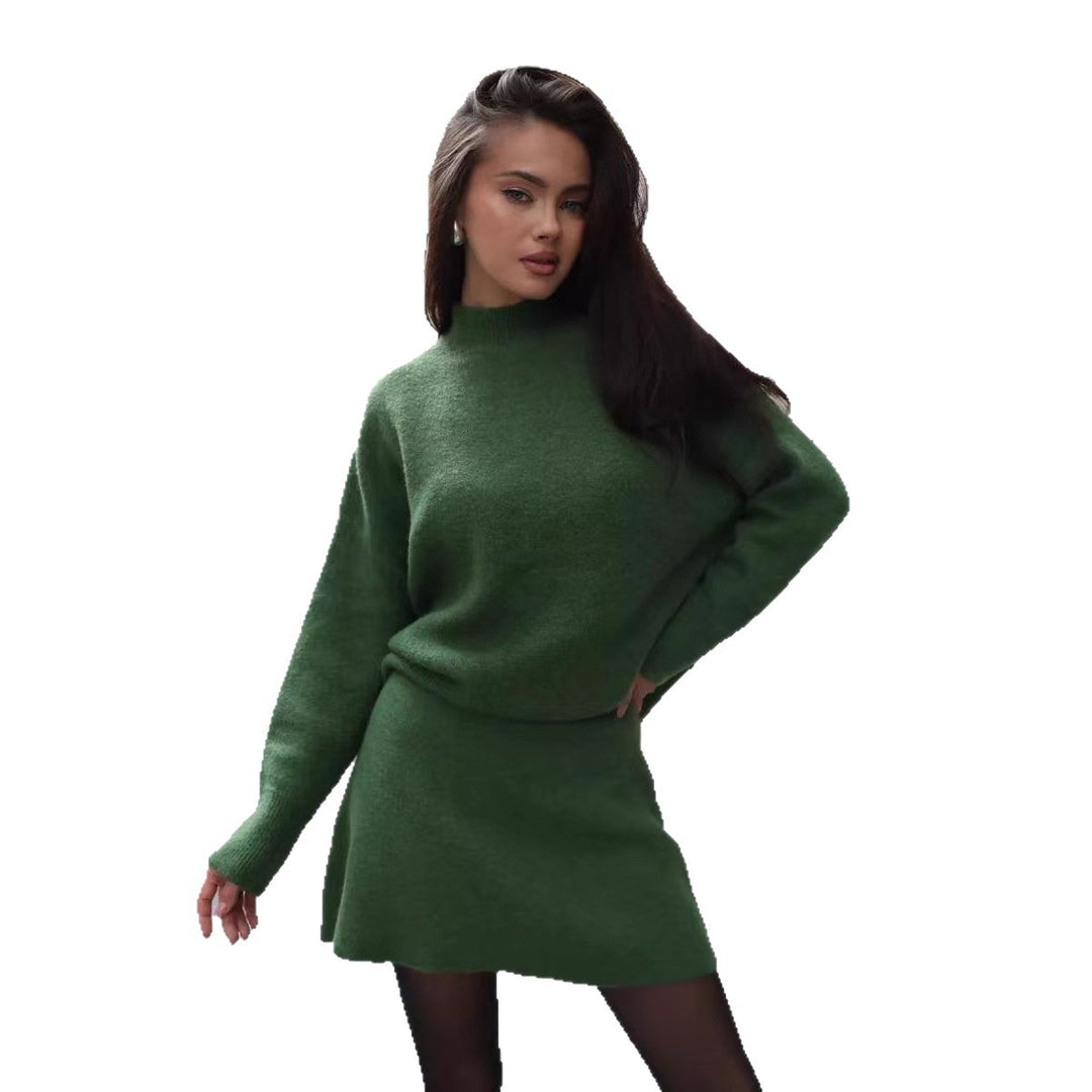 Damstickad klänning med elegant snitt och hög krage Mirla-Eva Jonsson