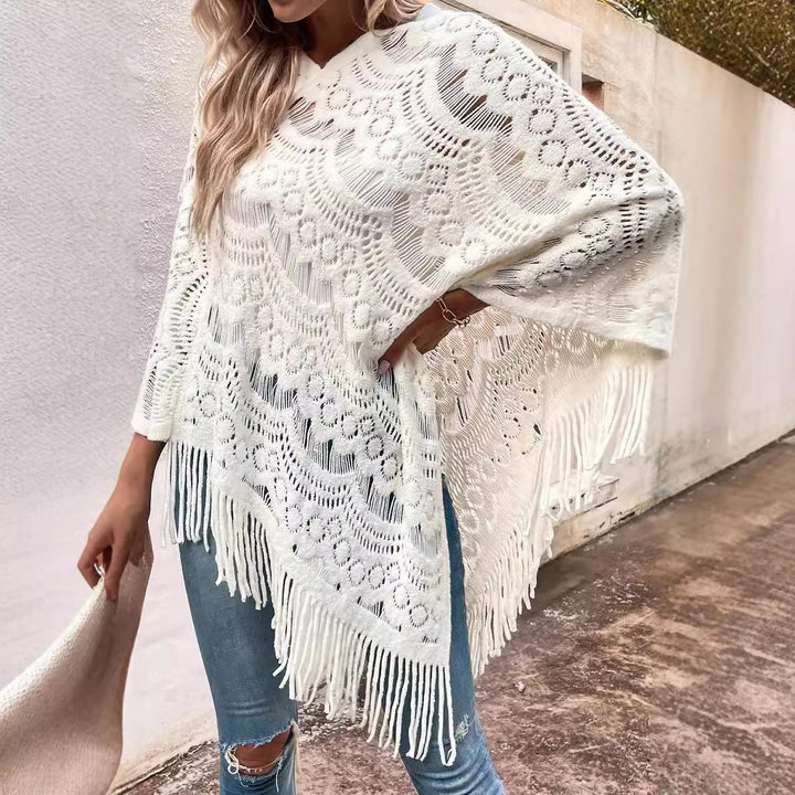 Damstickad poncho med iögonfallande virkade mönster och modefransar Eva Jonsson-Eva Jonsson
